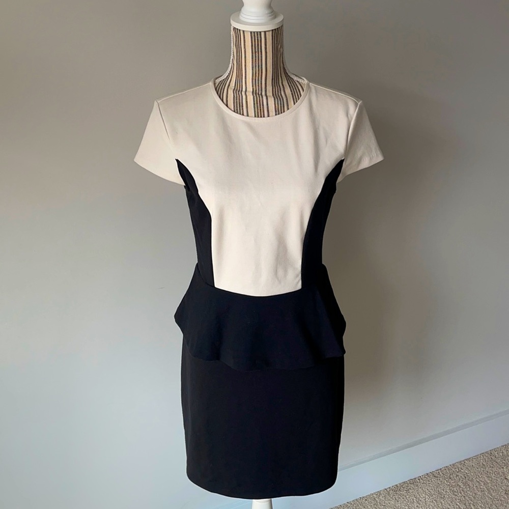 Black and cream short sleeve peplum dress